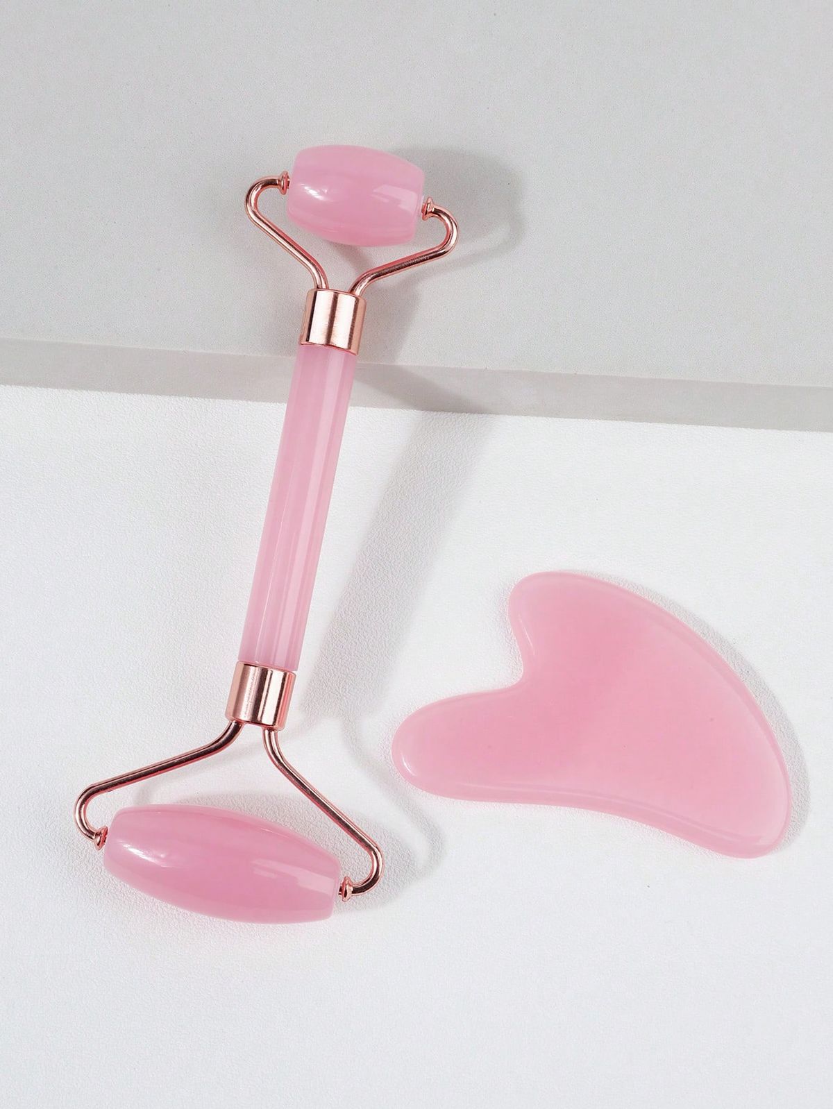 CONJUNTO CUIDADO PERSONAL (GUA SHA FACIAL + RODILLO) ROSADO